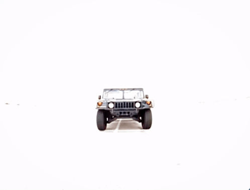 A Jeep Is Parked On A Gravel Road GIF