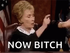 A Judge Is Sitting In A Courtroom And Pointing At Someone While Saying `` Now Bitch '' . GIF