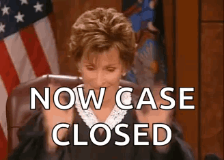 A Judge Is Sitting In A Courtroom With The Words `` Now Case Closed '' Written On The Screen Behind Her . GIF