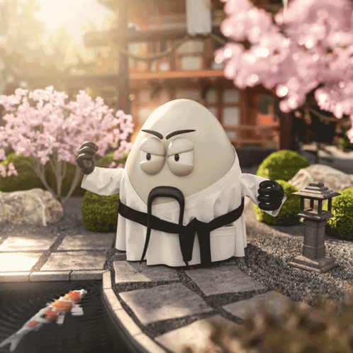 A Karate Egg Is Standing In A Garden With Flowers GIF
