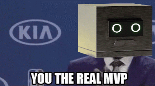 A Kia Logo Is Behind A Man In A Suit GIF