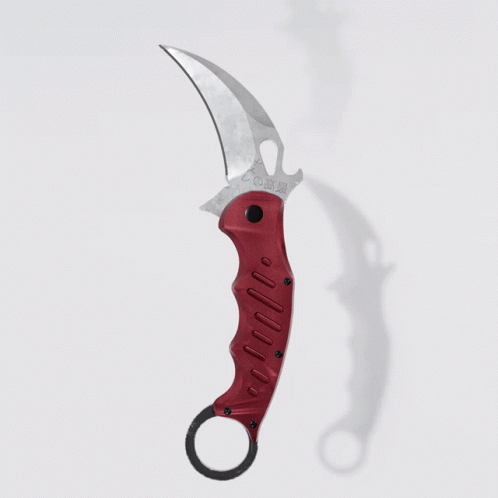 A Knife With A Red Handle And A White Blade GIF