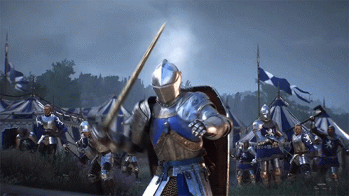 A Knight In Armor Is Holding A Sword In Front Of A Group Of Knights GIF