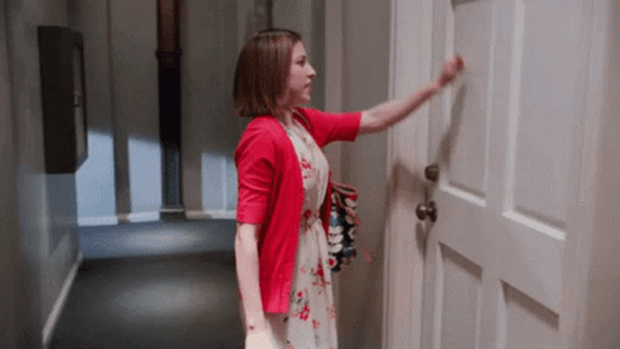 A Lady In A Red Blazer Knock Knock GIF