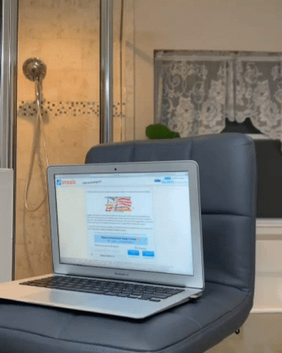 A Laptop Is Open To A Website That Says Omegle GIF