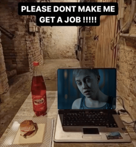A Laptop Sits On A Table Next To A Bottle Of Fanta Soda GIF