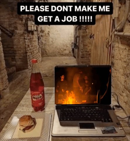 A Laptop Sits On A Table Next To A Coca Cola Bottle And A Hamburger GIF