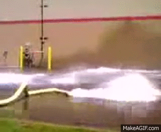 A Large Amount Of Water Is Coming Out Of The Ground GIF