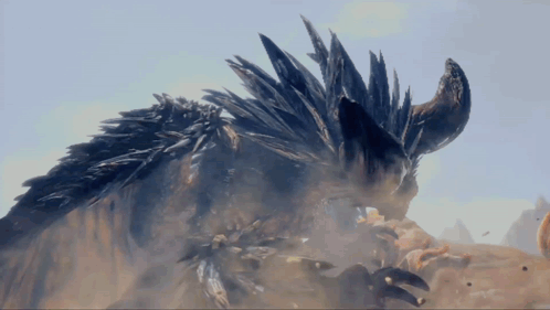 A Large Animal With Horns And Feathers On Its Head GIF