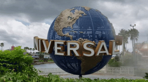 A Large Blue Globe With The Word Universal On It GIF