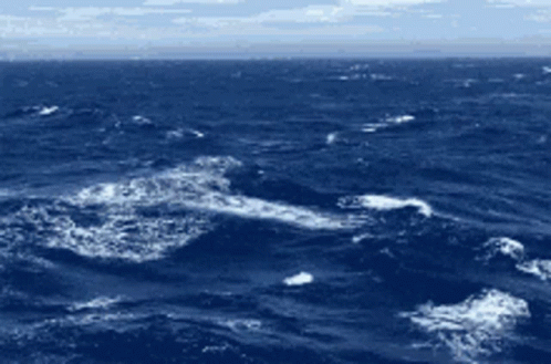 Large Water Body With Waves And Foam GIF