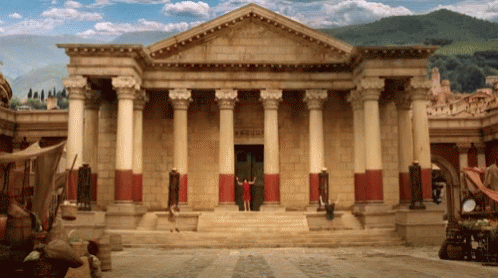 A Large Building With Columns And A Sign That Says ' Temple ' GIF