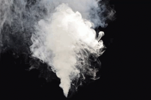 A Large Cloud Of White Smoke Is Coming Out Of A Bottle On A Black Background . GIF
