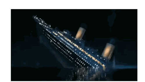 a large cruise ship is sinking in the ocean