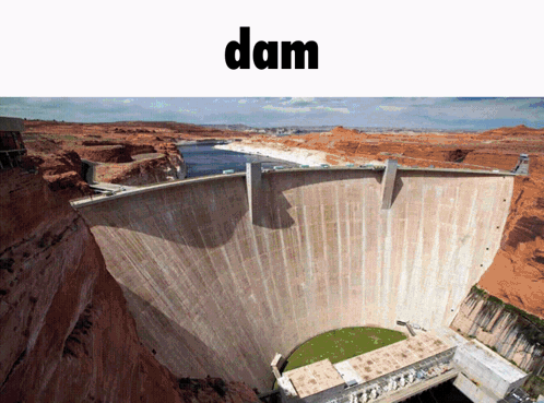 A Large Dam In The Middle Of A Desert With The Word Dam Below It GIF