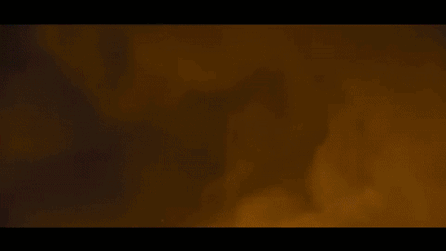 A Large Explosion With A Lot Of Flames And Smoke Coming Out Of It GIF