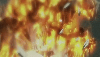 A Large Explosion With A Lot Of Flames Coming Out Of It GIF