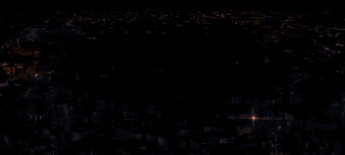 A Large Explosion With A Lot Of Flames Coming Out Of It . GIF