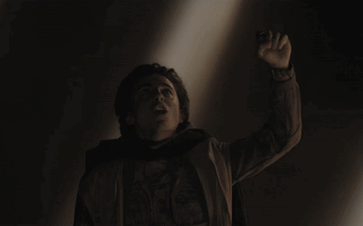 A Large Group Of People Are Gathered In A Dark Room With The Words " I Am The Voice From The Outer World " On The Bottom GIF