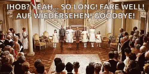 A Large Group Of People Are Standing In A Room With The Words Ihob Yeah So Long Fare Well Auf Wiedersehen Goodbye GIF