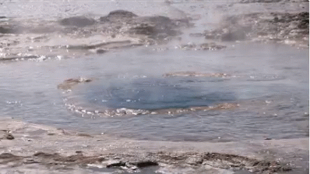 A Large Hole In The Middle Of A Body Of Water . GIF