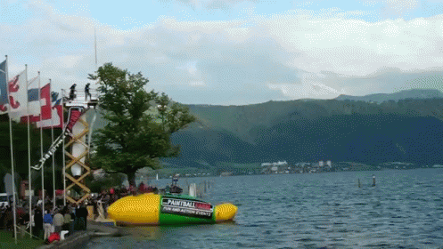 A Large Inflatable Boat With The Word Paintball On The Side Of It GIF