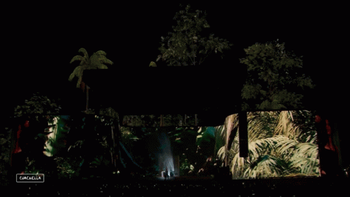 A Large Screen At A Concert Says Gazelle On The Bottom GIF
