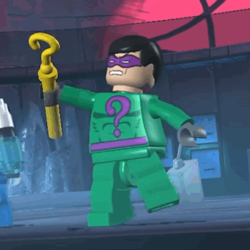 A Lego Character With A Question Mark On His Chest Is Holding A Cane GIF