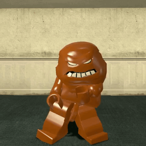 A Lego Figure Is Standing In A Room With A Wall Behind Him GIF