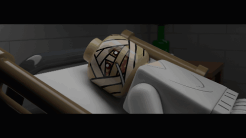 A Lego Figure With A Bandage On His Head Is Laying In A Hospital Bed GIF