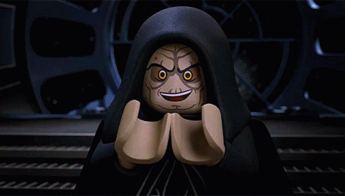 A Lego Star Wars Character Is Smiling With His Hands Folded In Front Of His Face GIF