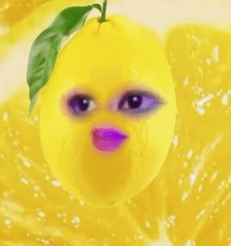 A Lemon With A Purple Mouth And Eyes GIF