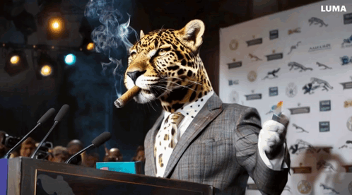 A Leopard In A Suit Smoking A Cigar And Giving A Speech GIF