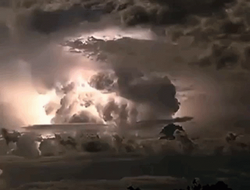 A Lightning Bolt Is Coming Out Of The Clouds GIF