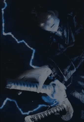 A Lightning Bolt Strikes A Statue Of A Snake GIF
