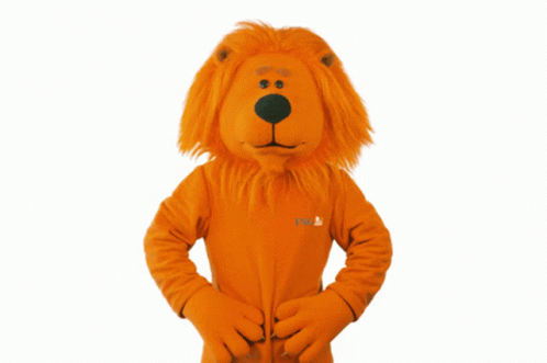 a lion mascot is wearing a shirt that says ' nl ' on it