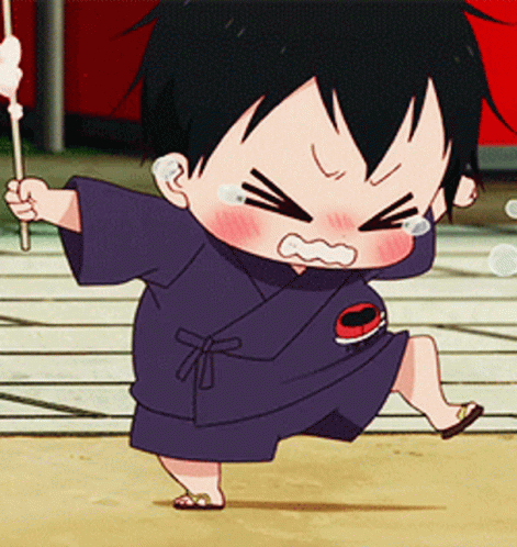 A Little Boy In A Blue Kimono Is Holding A Stick GIF