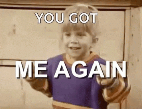 A Little Boy Is Pointing At The Camera And Says `` You Got Me Again '' . GIF