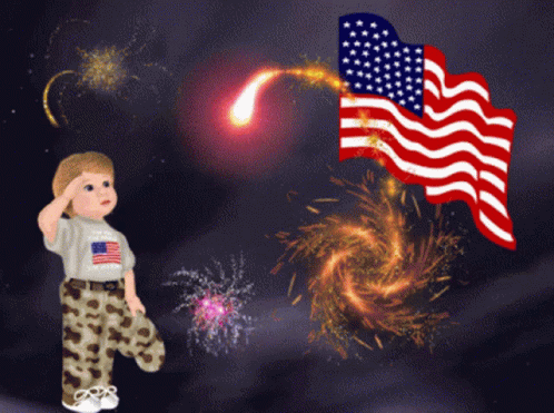 A Little Boy Salutes In Front Of An American Flag And Fireworks GIF