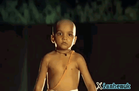 A Little Boy With A Tear Running Down His Face And The Words Xlamhamuk On The Bottom Right GIF