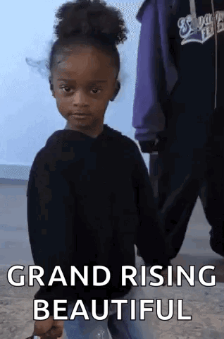 A Little Girl Holding Someone 'S Hand With The Words Grand Rising Beautiful On The Bottom GIF