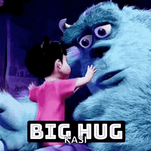 A Little Girl Hugging A Monster From Monsters Inc GIF