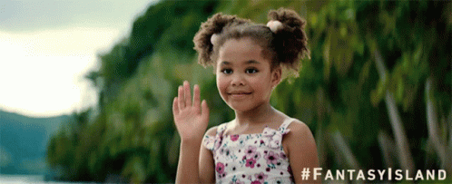A Little Girl In A Floral Dress Is Waving Her Hand In Front Of A Fantasy Island Logo GIF