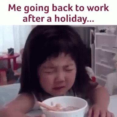 A Little Girl Is Crying While Eating A Bowl Of Soup . GIF