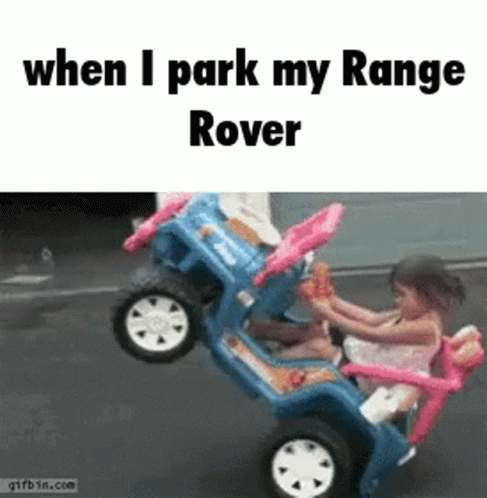 A Little Girl Is Driving A Toy Rover GIF