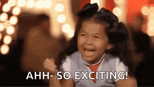A Little Girl Is Laughing With The Words Ahh-So Exciting Behind Her GIF