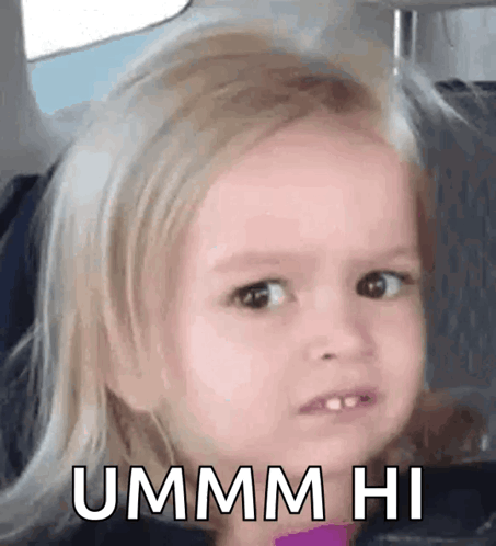 A Little Girl Is Making A Funny Face While Sitting In A Car . GIF