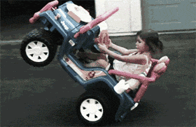 A Little Girl Is Sitting In A Jeep Toy Car GIF
