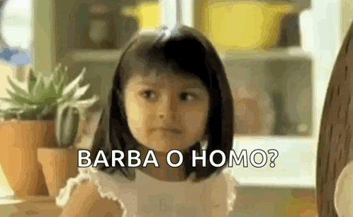 A Little Girl Is Sitting In Front Of A Window With The Words Barba O Homo . GIF