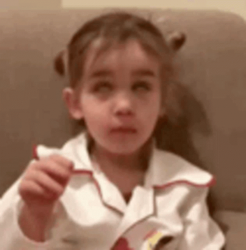Girl Sitting On Couch Eating Food GIF